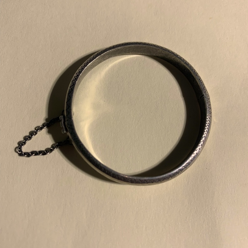 Vintage sterling silver babies bracelet with a security chain.